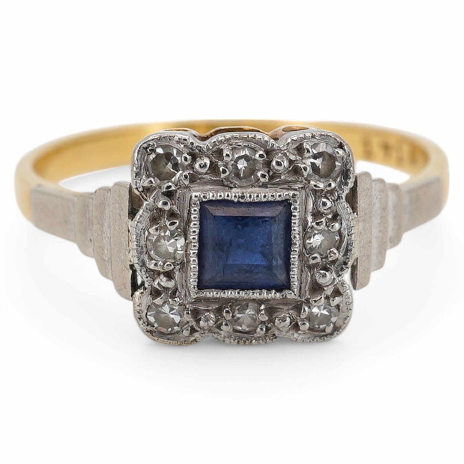 A 1920's 18ct and plat. sapphire and diamond set square cluster ring, size M, gross weight 2.5 grams. Condition - fair